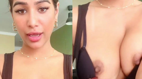 Bollywood actress Poonam Pandey caressing her boobs